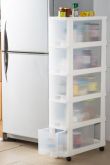 Узкий стеллаж на колесиках за холодильник