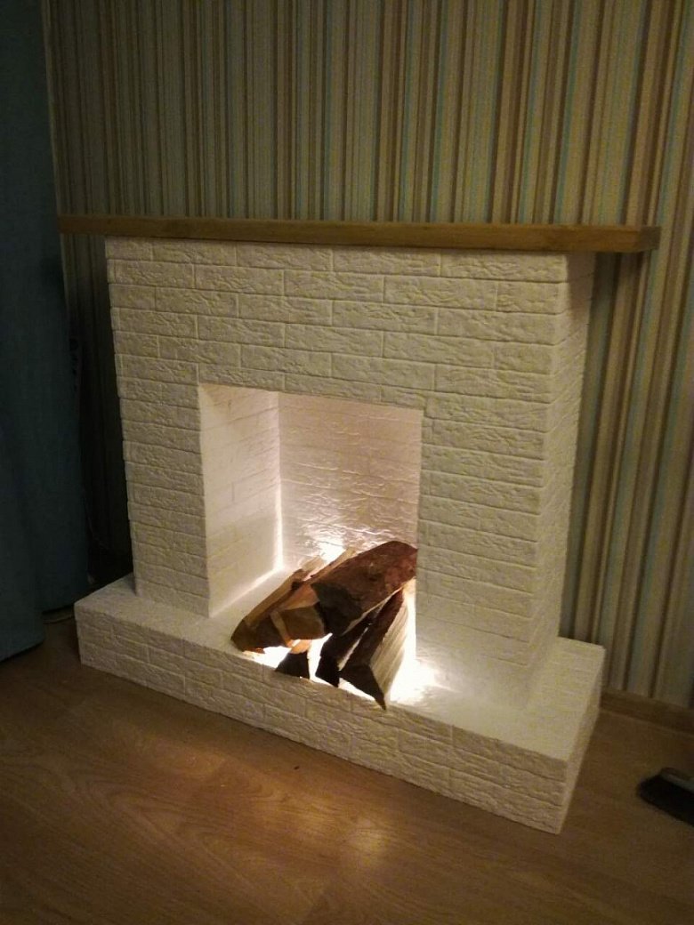 Камин с местом для дров