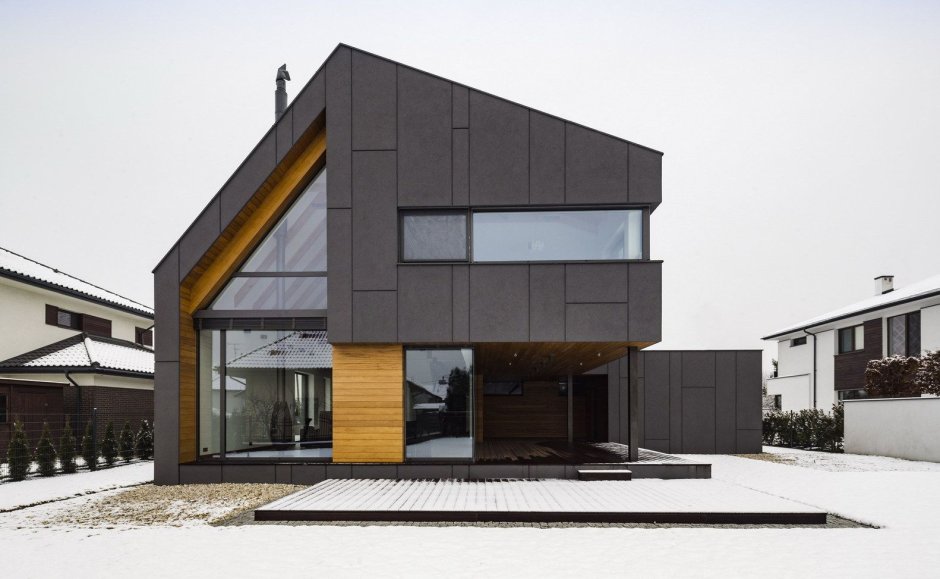 Дом в стиле Модерн с двускатной крышей