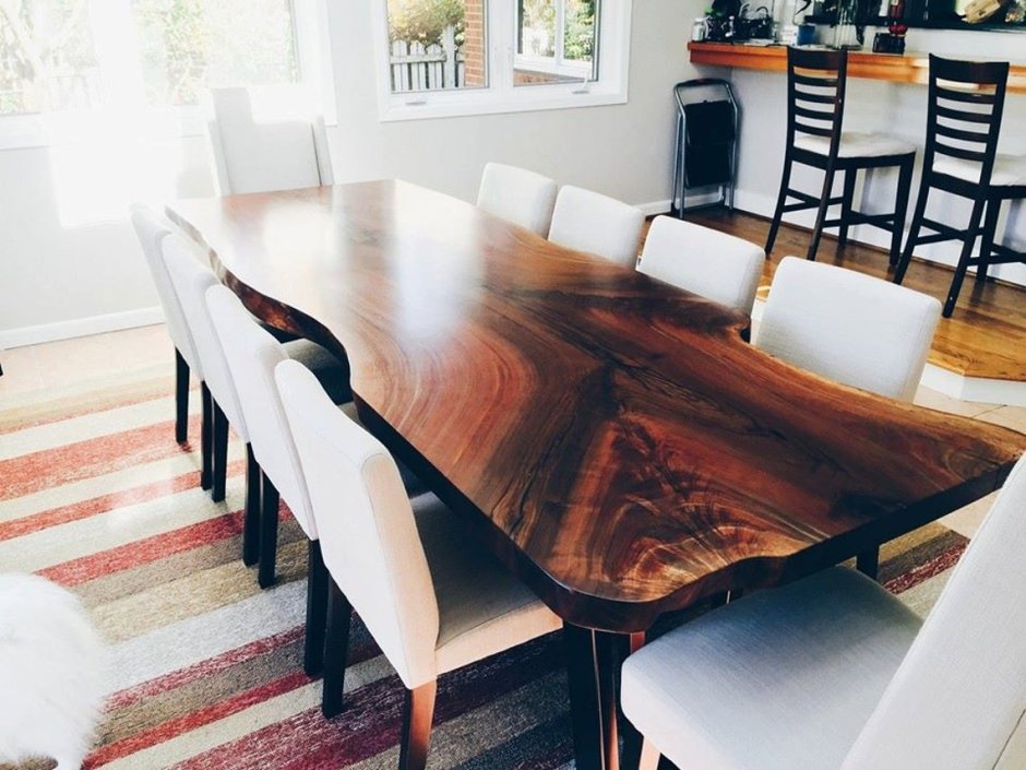 Natural Wood Table with Black Chairs
