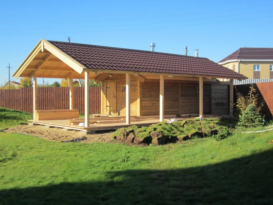 Гараж с верандой под одной крышей