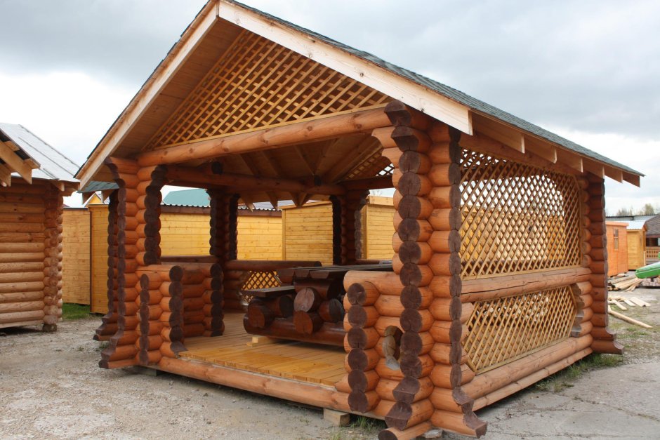 Беседка из оцилиндрованного бревна с мангалом