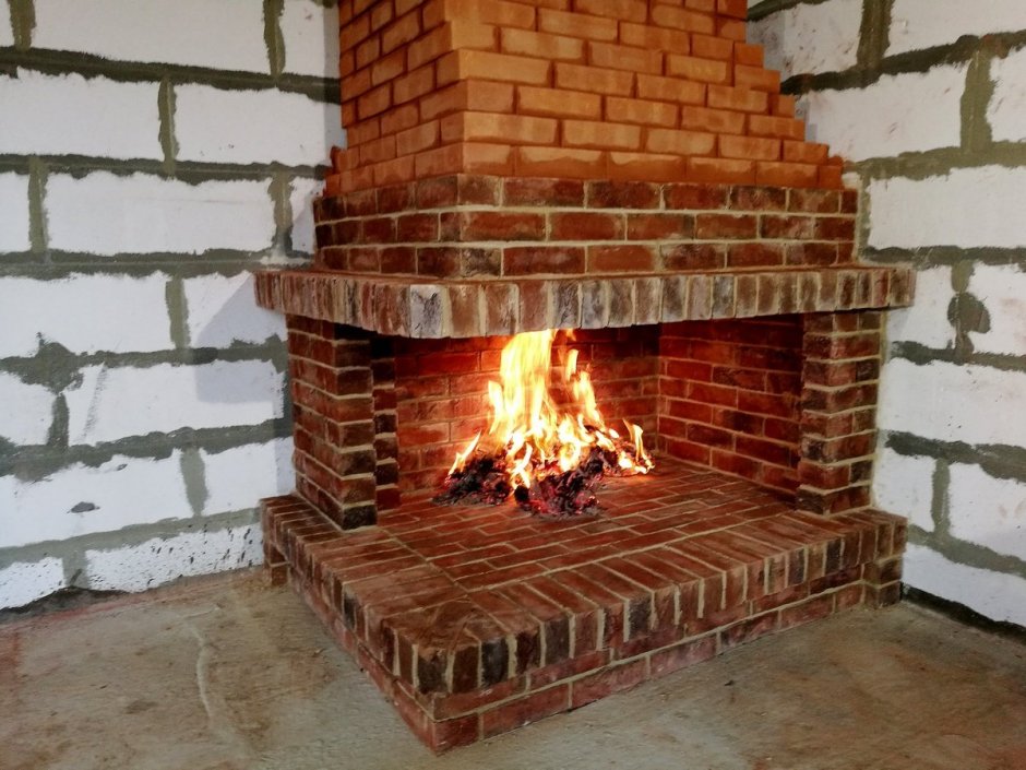 Камин кирпичный угловой