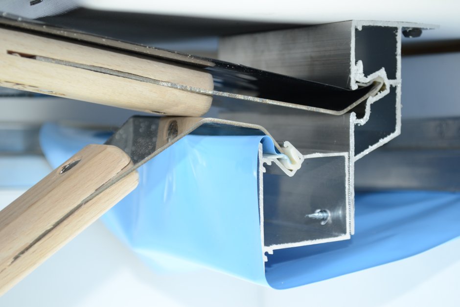 Гарпунная система крепления натяжных