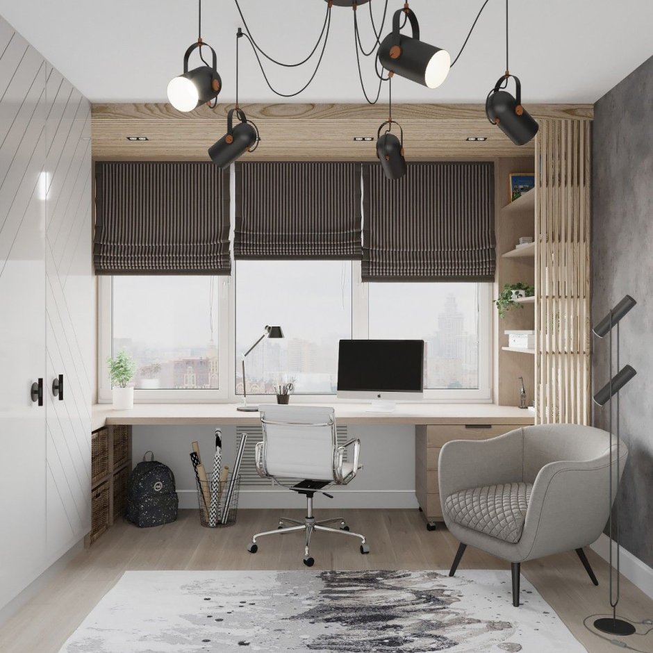 Рабочее место у окна в комнате подростка