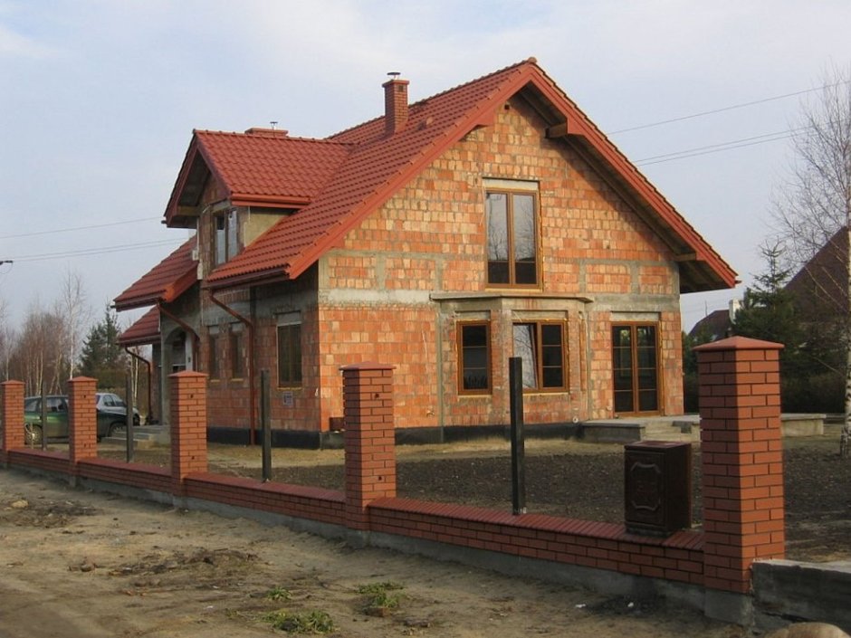 Дома с мансардой из кирпича