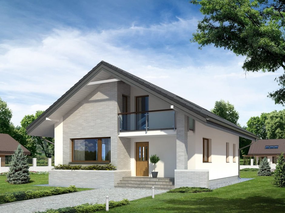 Полутораэтажный дом из газобетона с террасой