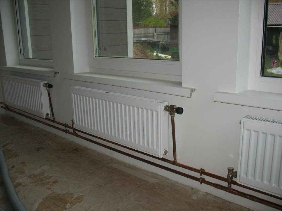 Вертикальные трубы отопления