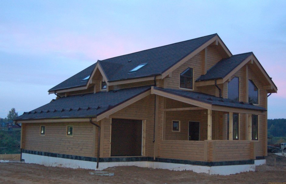 Пристройка гаража к деревянному дому