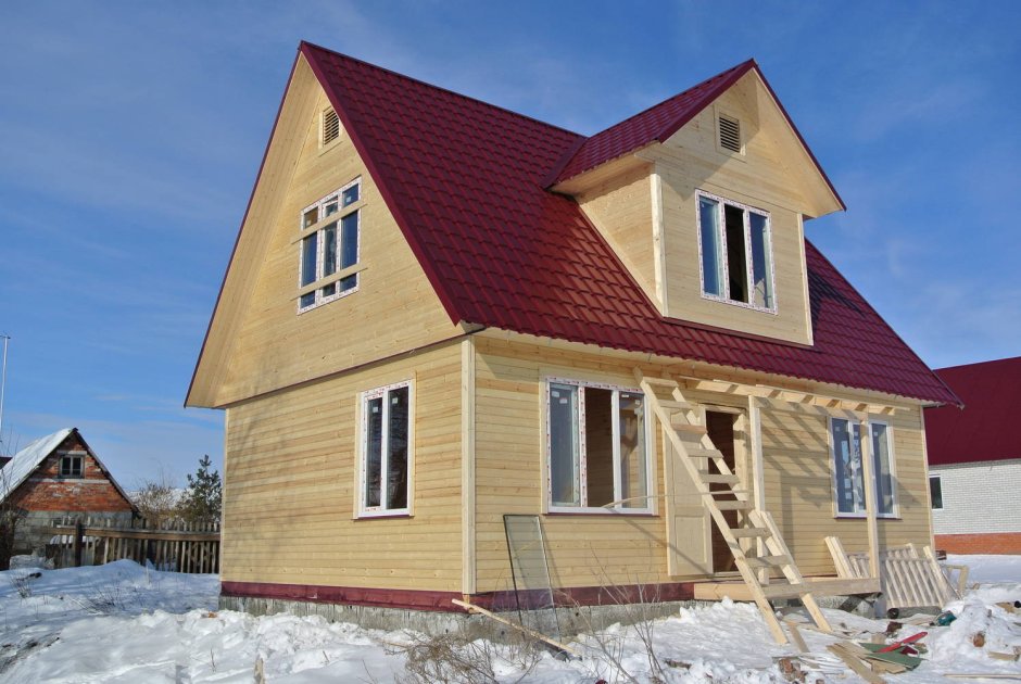 Каркасный дом зимой