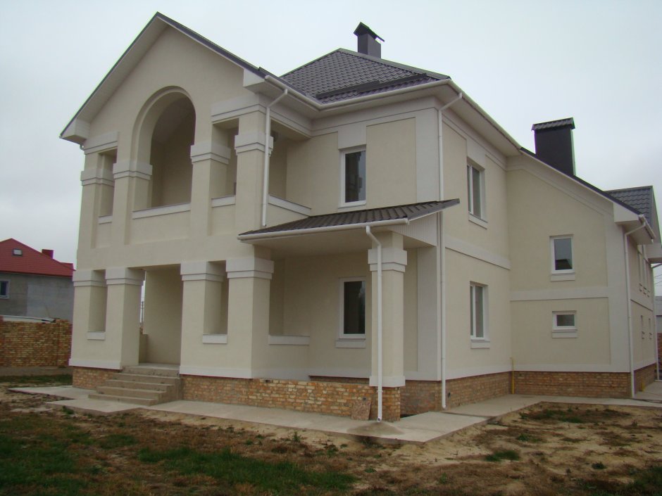 Оштукатуренные фасады домов