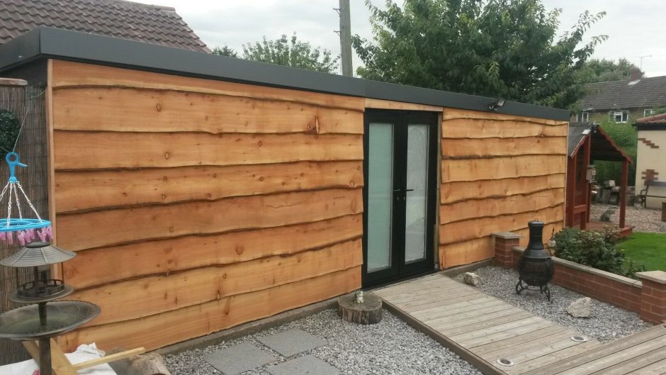 Сарай обшитый доской