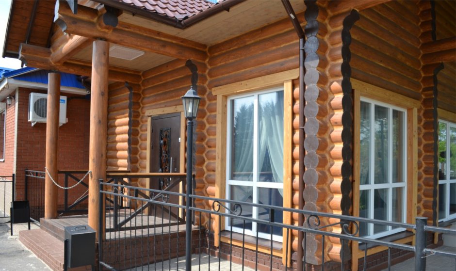 Отделка фасада деревянного дома