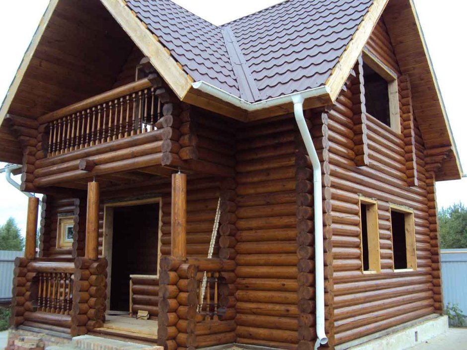 Отделка дома из бревна снаружи
