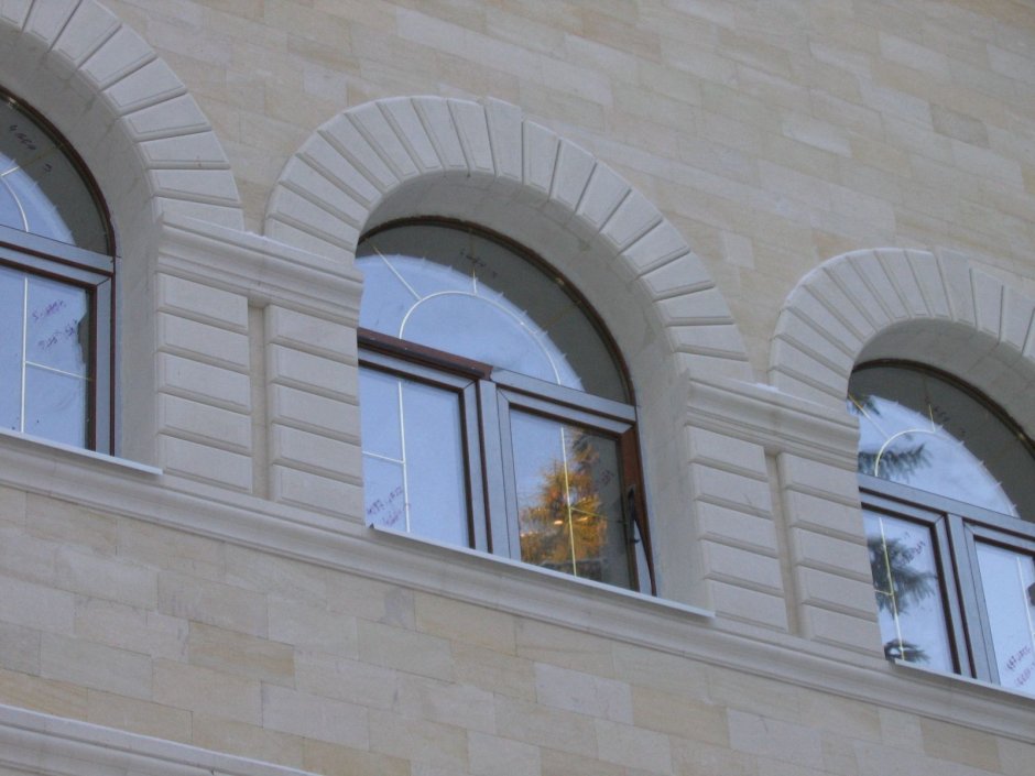 Отделка арочных окон снаружи