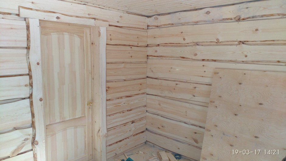 Отделка бани необрезной доской