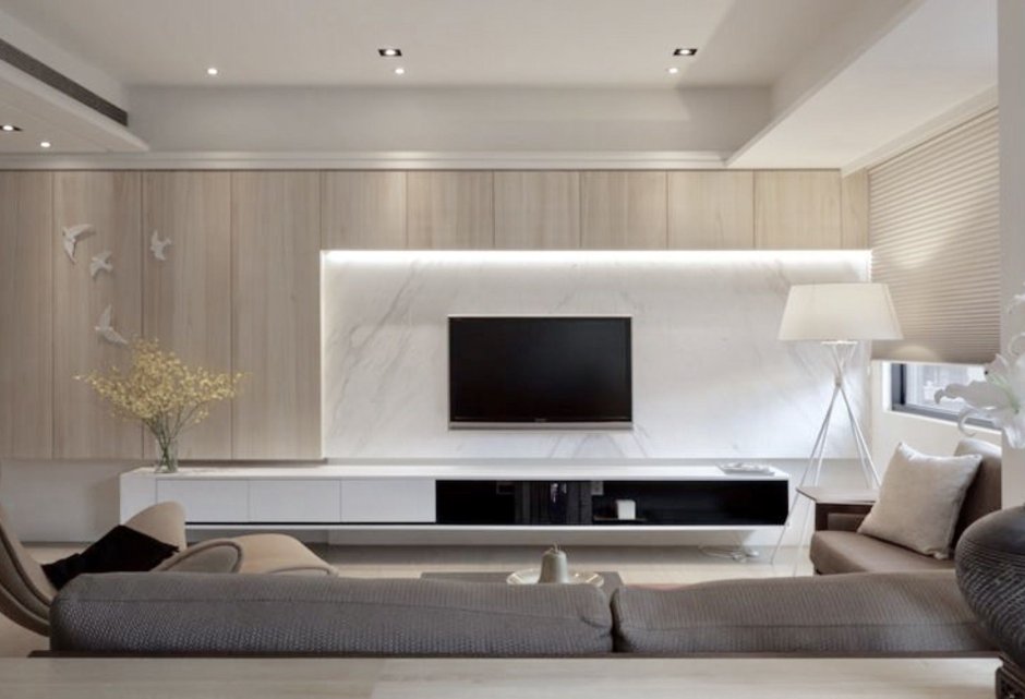 Телевизор в интерьере гостиной в современном стиле
